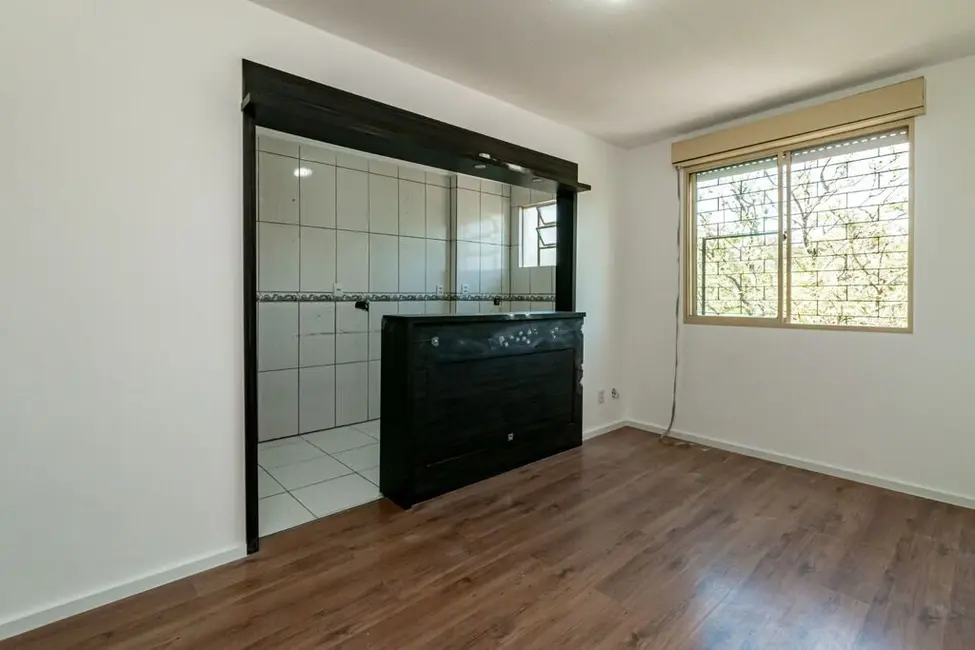 Foto 2 de Apartamento com 2 quartos à venda, 49m2 em Jardim Itu, Porto Alegre - RS