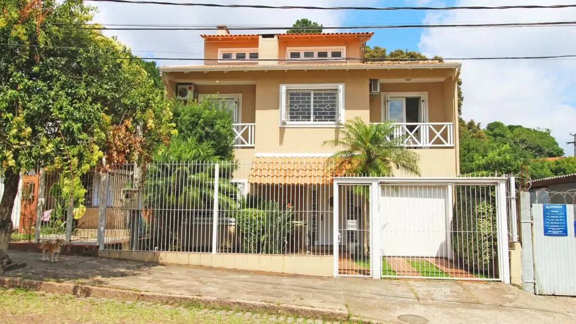 Casa com 4 quartos à venda, 243m2 em Partenon, Porto Alegre - RS - imagem 1 Foto 1 de Casa com 4 quartos à venda, 243m2 em Partenon, Porto Alegre - RS