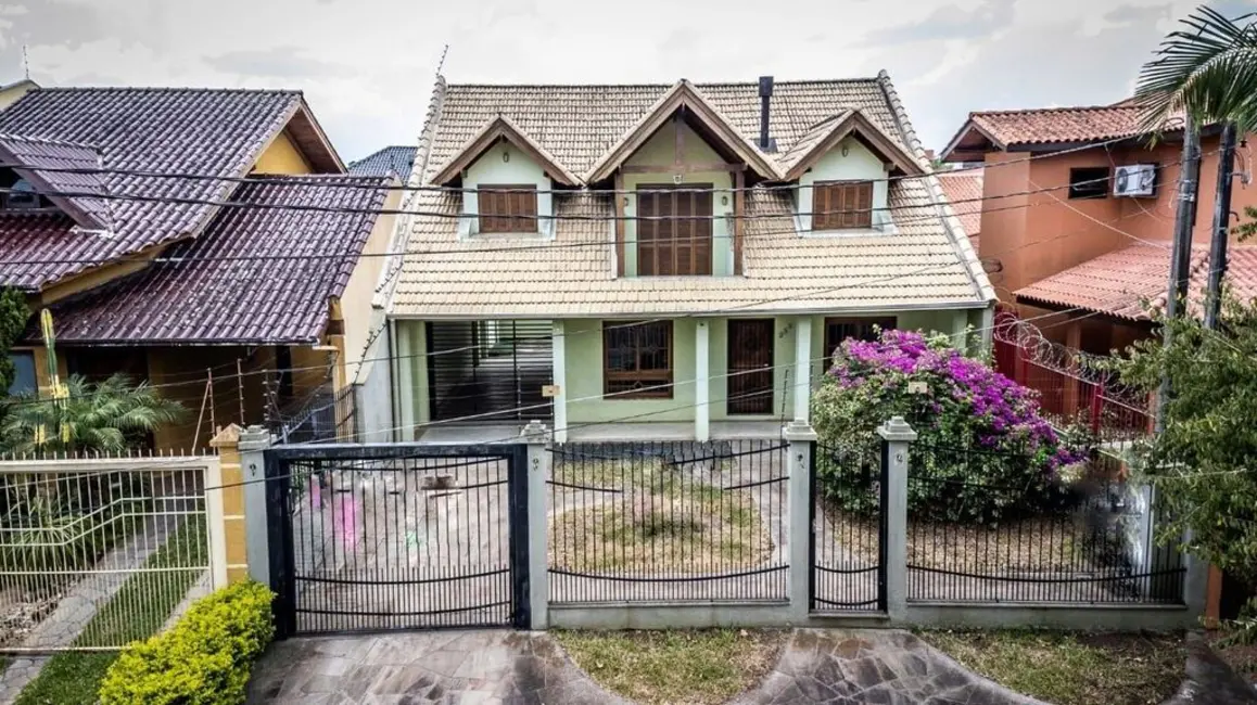 Foto 1 de Casa com 2 quartos à venda, 306m2 em Parque Santa Fé, Porto Alegre - RS