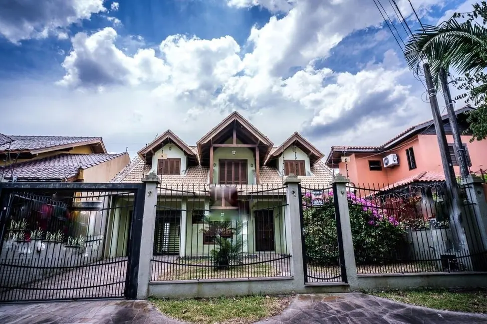 Foto 2 de Casa com 2 quartos à venda, 306m2 em Parque Santa Fé, Porto Alegre - RS