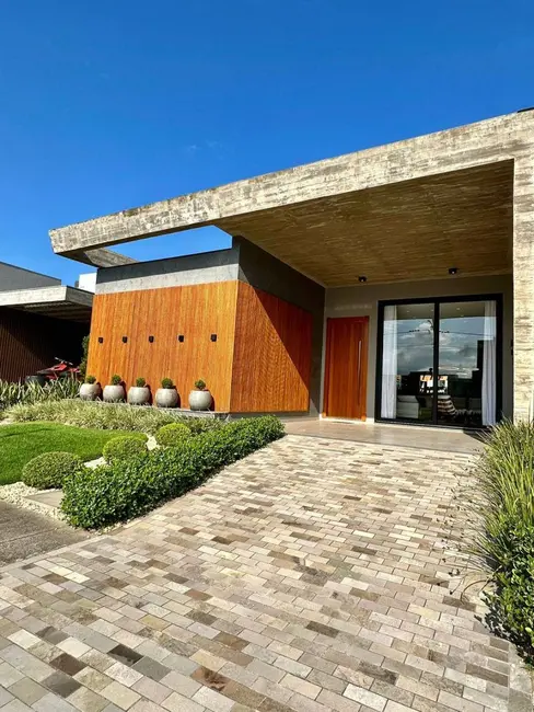Foto 1 de Casa de Condomínio com 3 quartos à venda, 198m2 em Capao Da Canoa - RS