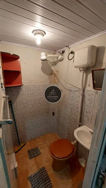 Foto 4 de Casa com 4 quartos à venda, 134m2 em Princesa, Praia Grande - SP