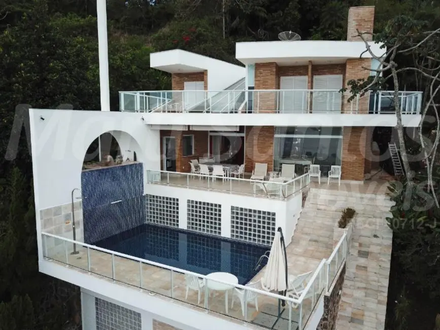 Foto 1 de Casa de Condomínio com 6 quartos à venda, 313m2 em Ilhabela - SP