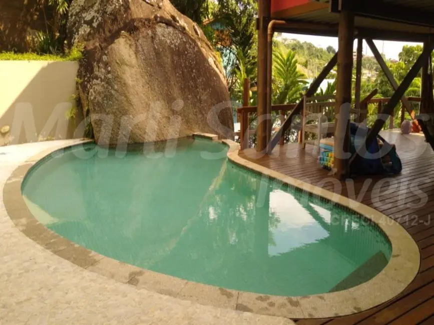 Foto 1 de Casa de Condomínio com 4 quartos à venda, 394m2 em Ilhabela - SP