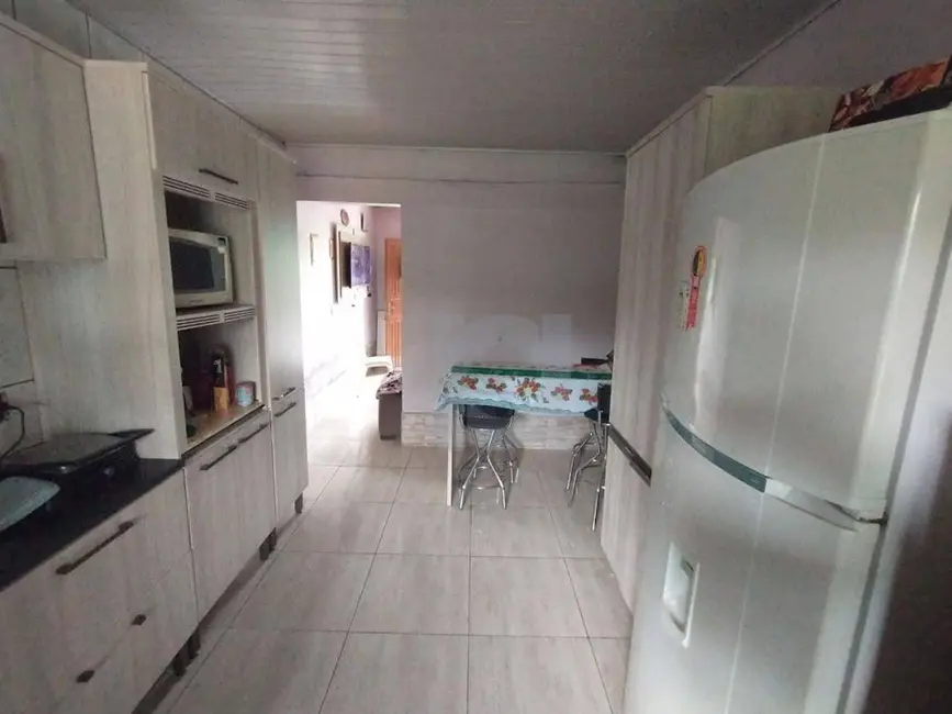 Casa com 3 quartos à venda, 300m2 em Centro, Portao - RS - imagem 5 Foto 5 de Casa com 3 quartos à venda, 300m2 em Centro, Portao - RS