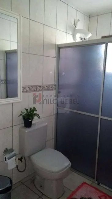 Casa com 3 quartos à venda, 138m2 em Centro, Portao - RS - imagem 9 Foto 9 de Casa com 3 quartos à venda, 138m2 em Centro, Portao - RS