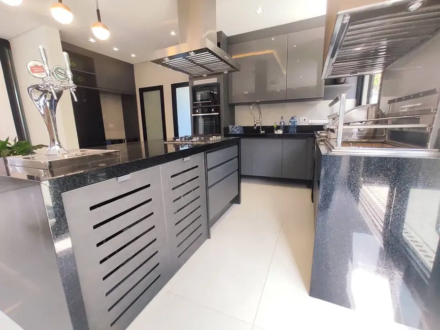 Foto 6 de Casa com 5 quartos à venda, 335m2 em Riviera de São Lourenço, Bertioga - SP