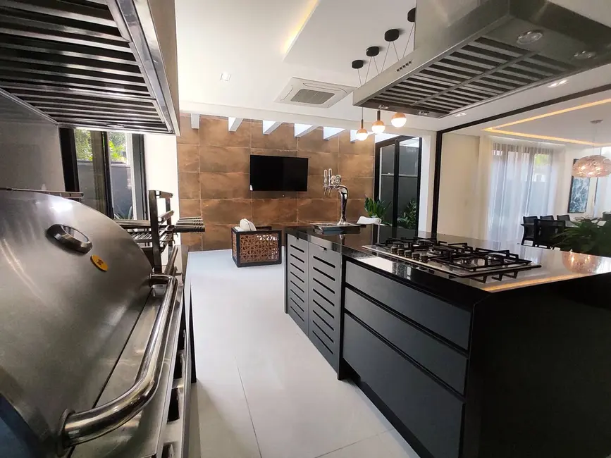 Foto 4 de Casa com 5 quartos à venda, 335m2 em Riviera de São Lourenço, Bertioga - SP