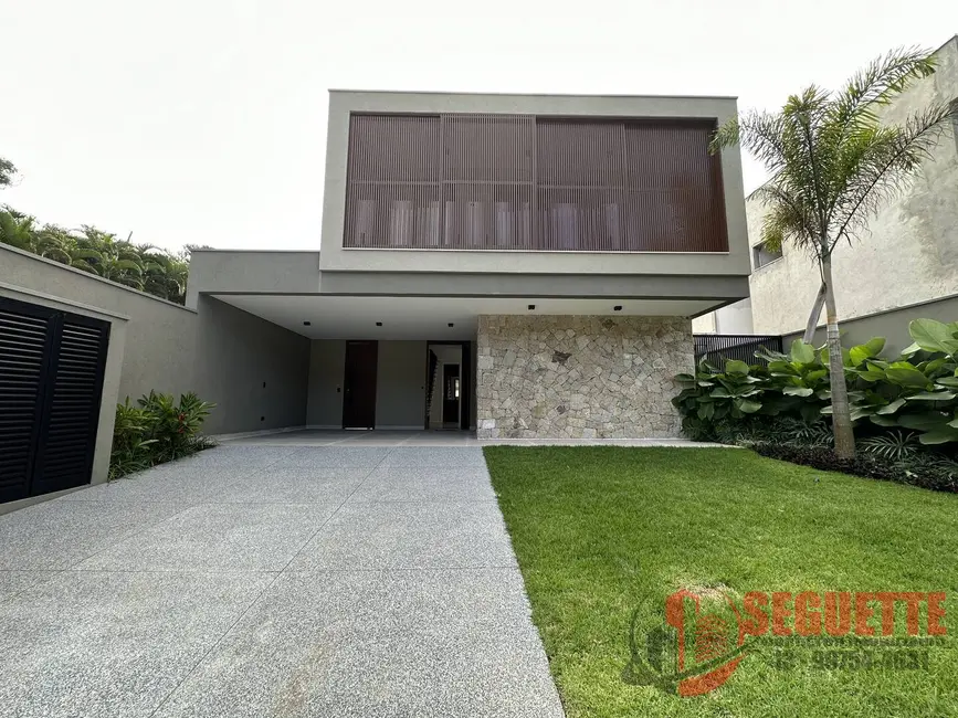 Casa com 4 quartos à venda, 335m2 em Riviera de São Lourenço, Bertioga - SP - imagem 1 Foto 1 de Casa com 4 quartos à venda, 335m2 em Riviera de São Lourenço, Bertioga - SP