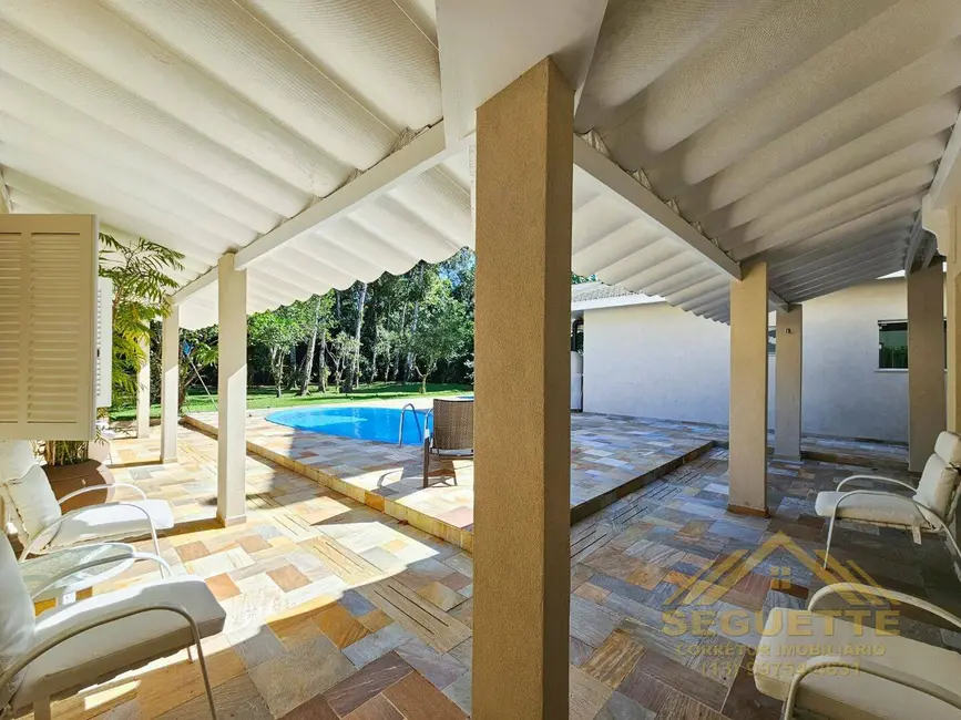 Foto 3 de Casa com 4 quartos à venda, 450m2 em Riviera de São Lourenço, Bertioga - SP