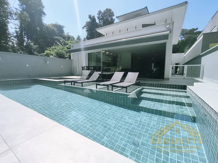 Foto 1 de Casa com 4 quartos à venda, 240m2 em Riviera de São Lourenço, Bertioga - SP