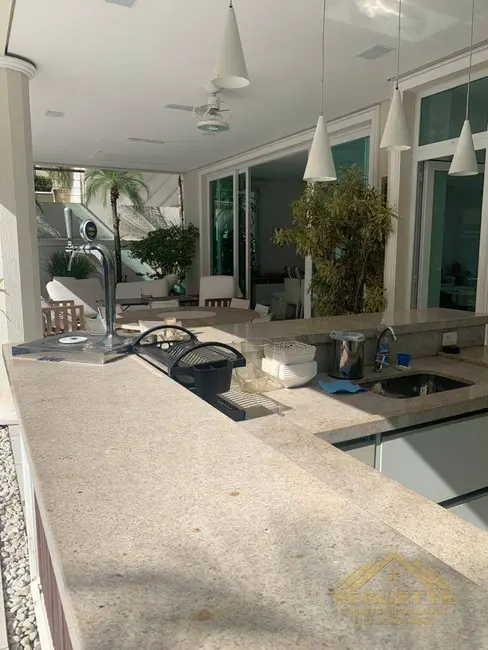 Foto 3 de Casa com 6 quartos à venda, 475m2 em Riviera de São Lourenço, Bertioga - SP