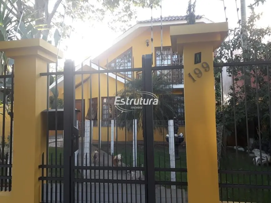 Casa com 4 quartos à venda, 262m2 em Nossa Senhora do Perpétuo Socorro, Santa Maria - RS - imagem 3 Foto 3 de Casa com 4 quartos à venda, 262m2 em Nossa Senhora do Perpétuo Socorro, Santa Maria - RS