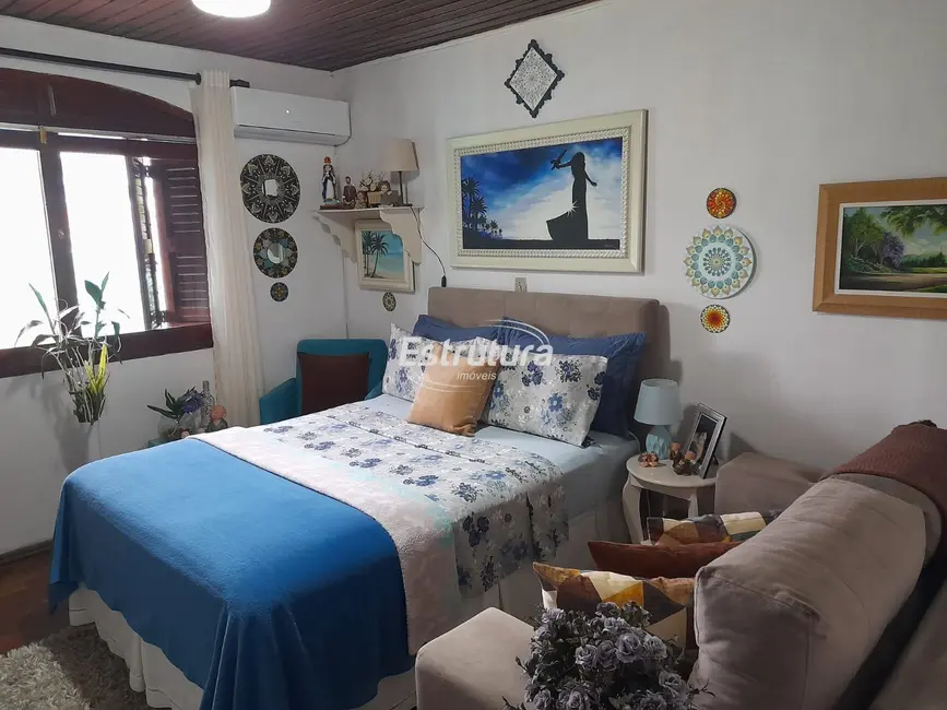 Casa com 3 quartos à venda, 144m2 em Juscelino Kubitschek, Santa Maria - RS - imagem 8 Foto 8 de Casa com 3 quartos à venda, 144m2 em Juscelino Kubitschek, Santa Maria - RS