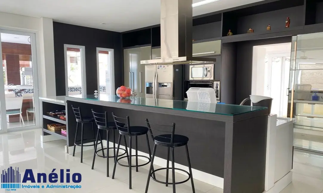 Foto 8 de Casa de Condomínio com 6 quartos para alugar em Jardim Acapulco, Guaruja - SP