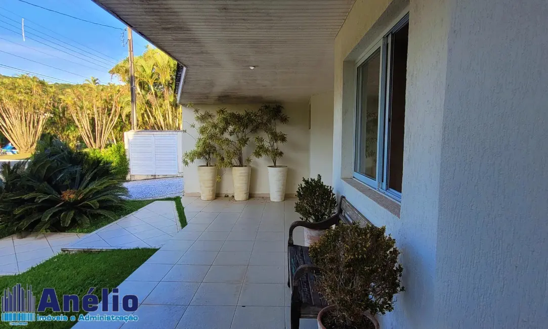 Foto 6 de Casa de Condomínio com 4 quartos para alugar, 450m2 em Jardim Acapulco, Guaruja - SP