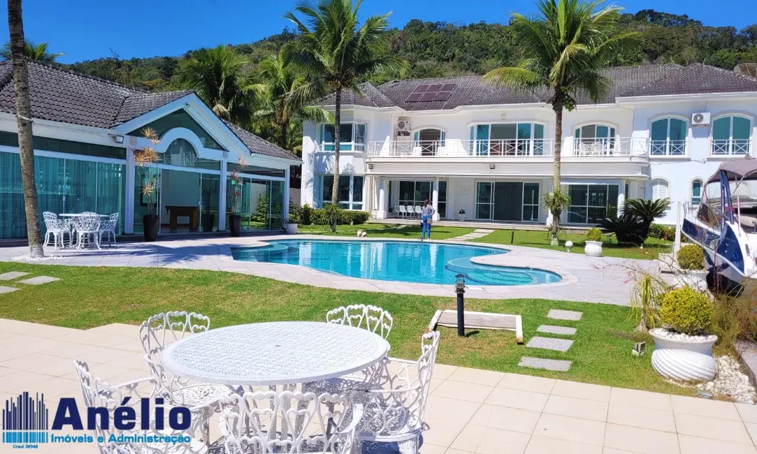 Casa de Condomínio com 4 quartos à venda e para alugar, 850m2 em Guaruja - SP - imagem 1 Foto 1 de Casa de Condomínio com 4 quartos à venda e para alugar, 850m2 em Guaruja - SP