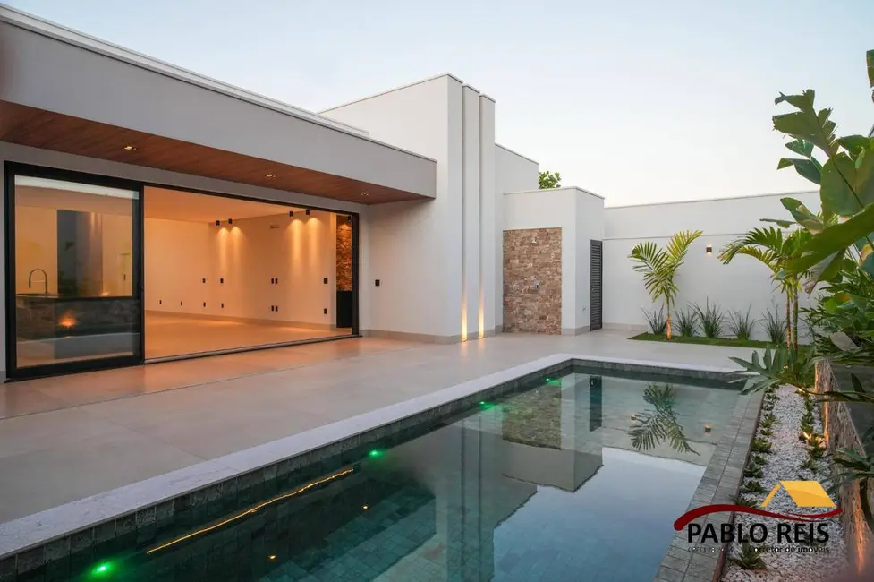 Foto 4 de Casa com 3 quartos à venda em Monte Carmelo - MG