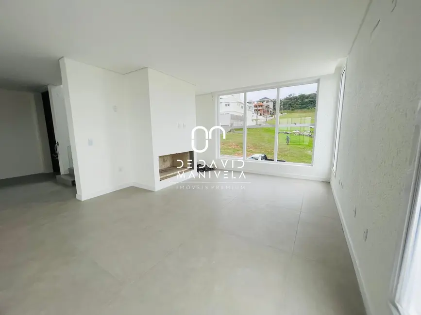 Foto 6 de Casa de Condomínio com 3 quartos à venda, 300m2 em Tomazetti, Santa Maria - RS