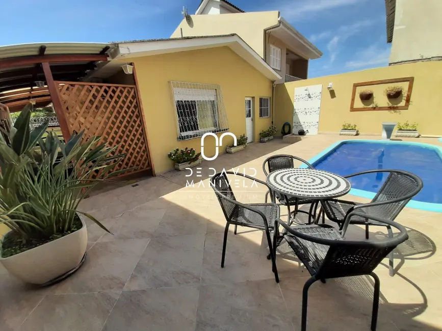 Foto 1 de Casa com 3 quartos à venda, 184m2 em Juscelino Kubitschek, Santa Maria - RS