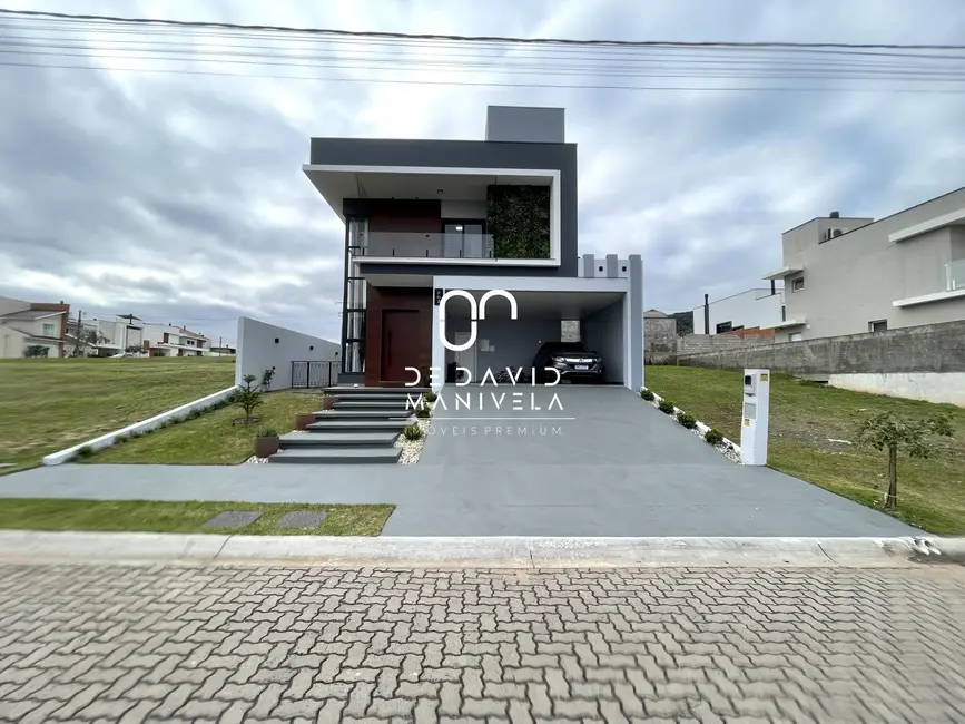 Foto 1 de Casa de Condomínio com 3 quartos à venda, 163m2 em Tomazetti, Santa Maria - RS