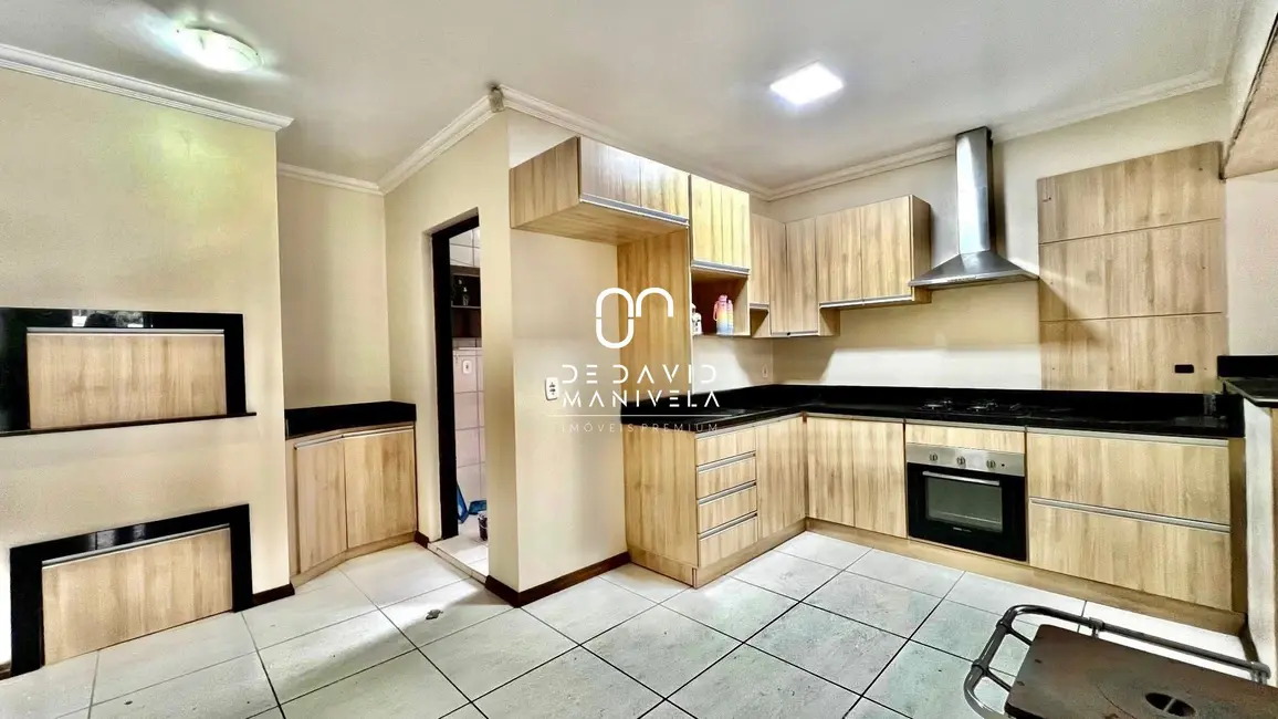 Foto 1 de Casa com 3 quartos à venda, 102m2 em Juscelino Kubitschek, Santa Maria - RS