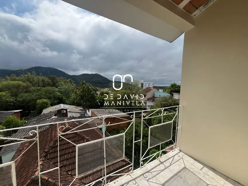 Casa com 3 quartos para alugar, 250m2 em Nossa Senhora das Dores, Santa Maria - RS - imagem 2 Foto 2 de Casa com 3 quartos para alugar, 250m2 em Nossa Senhora das Dores, Santa Maria - RS