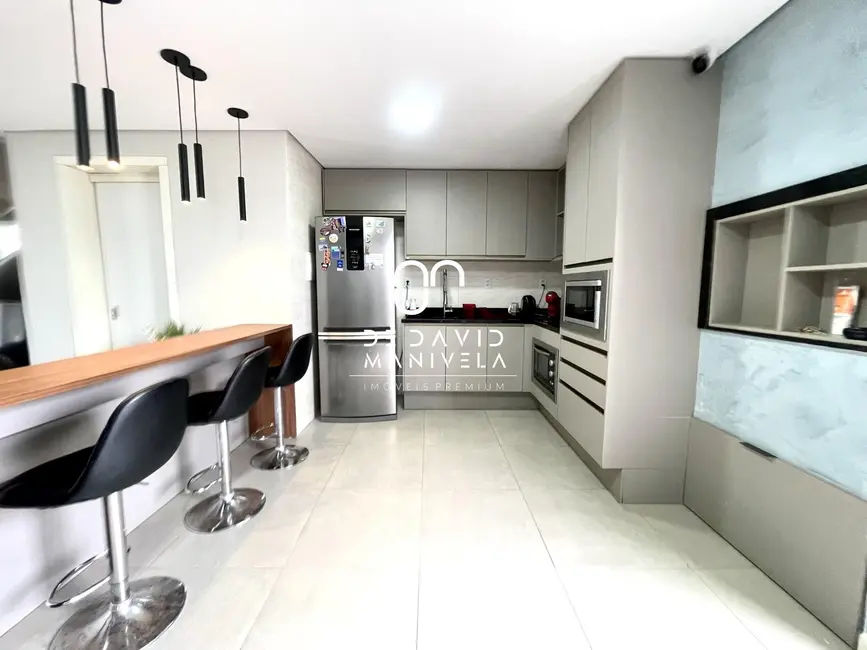 Foto 8 de Casa de Condomínio com 3 quartos à venda, 155m2 em Diácono João Luiz Pozzobon, Santa Maria - RS