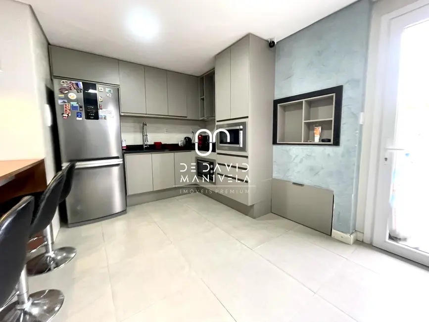 Foto 9 de Casa de Condomínio com 3 quartos à venda, 155m2 em Diácono João Luiz Pozzobon, Santa Maria - RS