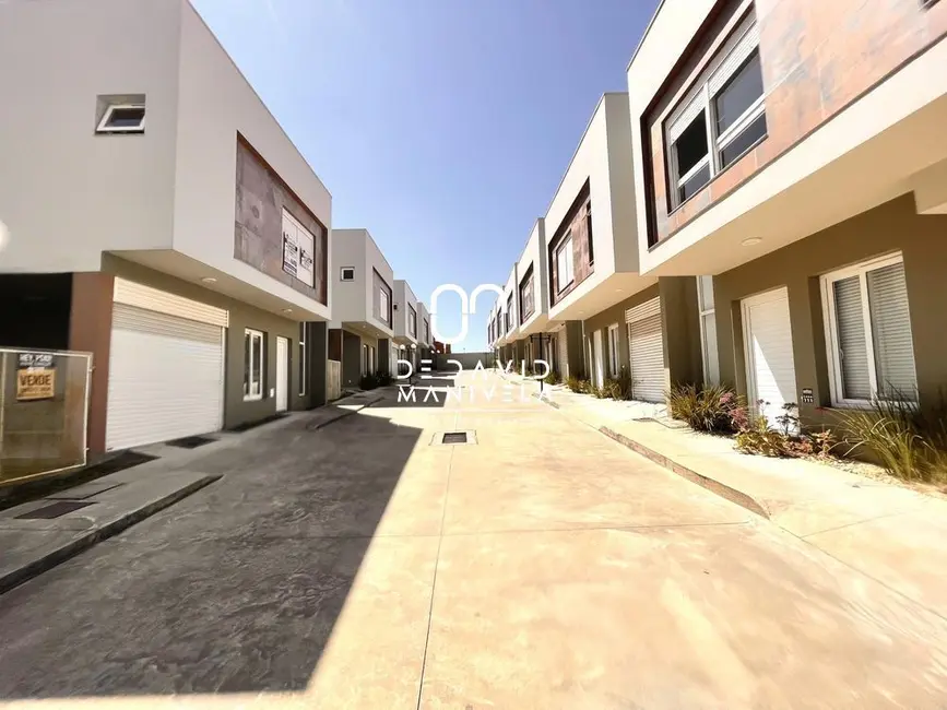 Foto 1 de Casa de Condomínio com 3 quartos à venda, 155m2 em Diácono João Luiz Pozzobon, Santa Maria - RS