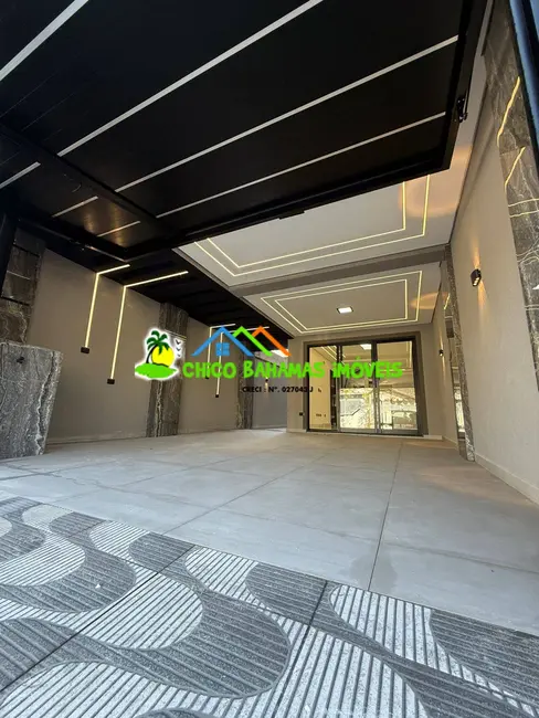 Foto 2 de Sobrado com 4 quartos à venda em Boqueirão, Praia Grande - SP