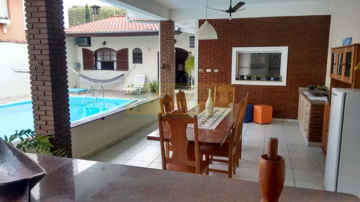 Foto 1 de Casa com 4 quartos à venda, 200m2 em Martim de Sá, Caraguatatuba - SP