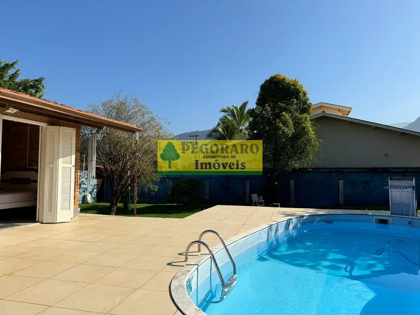 Foto 1 de Casa com 4 quartos à venda, 250m2 em Martim de Sá, Caraguatatuba - SP