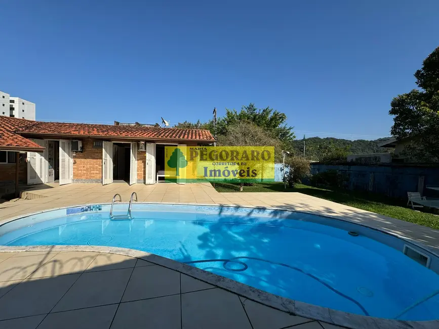 Casa com 4 quartos à venda, 250m2 em Martim de Sá, Caraguatatuba - SP - imagem 3 Foto 3 de Casa com 4 quartos à venda, 250m2 em Martim de Sá, Caraguatatuba - SP