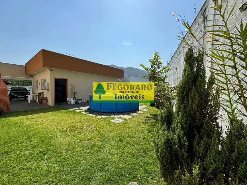 Foto 1 de Casa com 3 quartos à venda, 102m2 em Martim de Sá, Caraguatatuba - SP