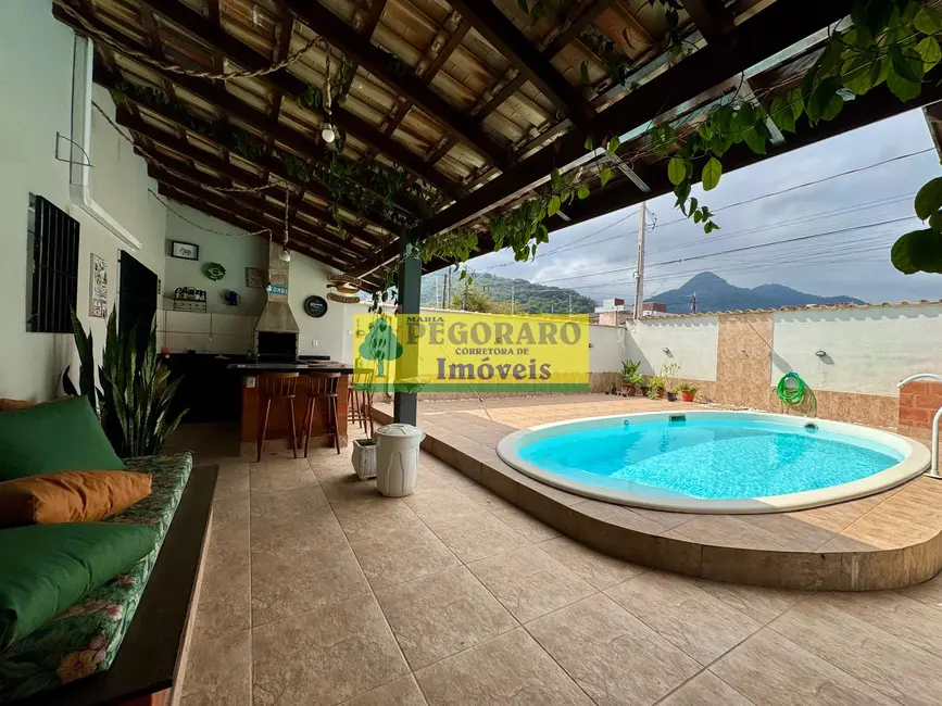 Foto 3 de Casa com 7 quartos à venda, 288m2 em Sumaré, Caraguatatuba - SP