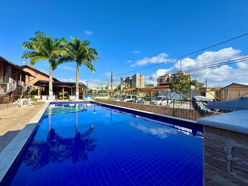 Foto 2 de Apartamento com 1 quarto para alugar, 55m2 em Martim de Sá, Caraguatatuba - SP
