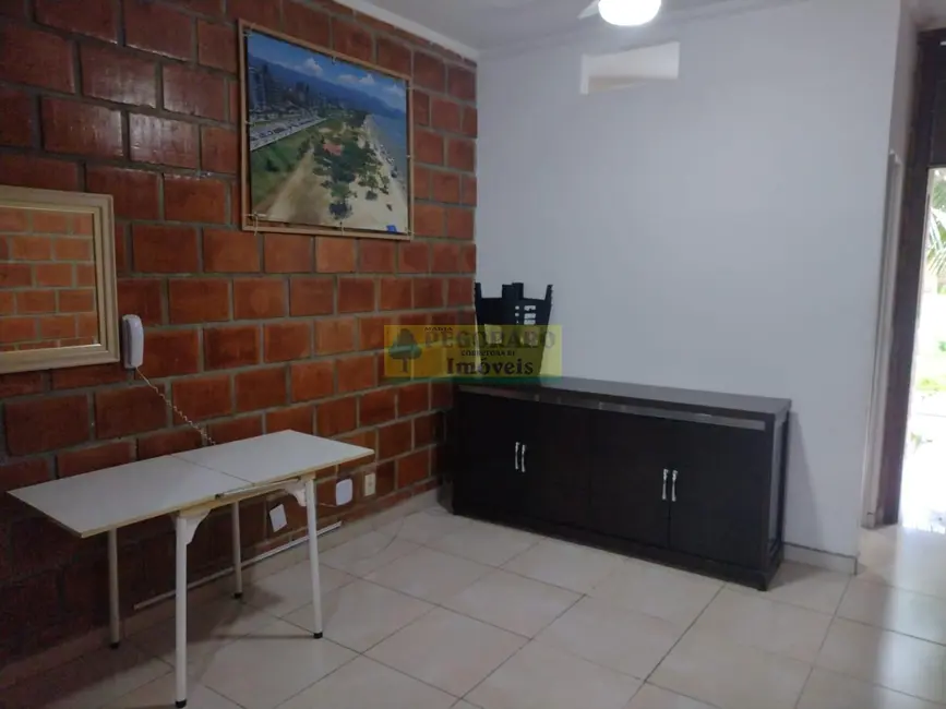 Foto 2 de Apartamento com 1 quarto para alugar, 40m2 em Martim de Sá, Caraguatatuba - SP
