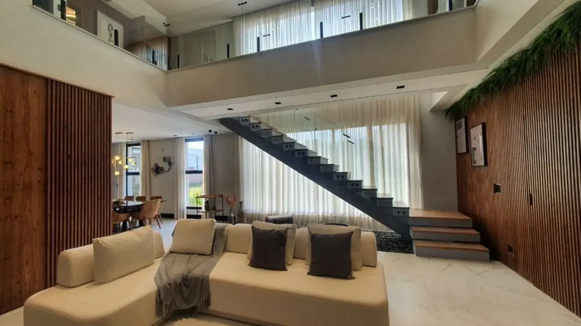 Foto 2 de Casa com 5 quartos à venda, 389m2 em Riviera de São Lourenço, Bertioga - SP