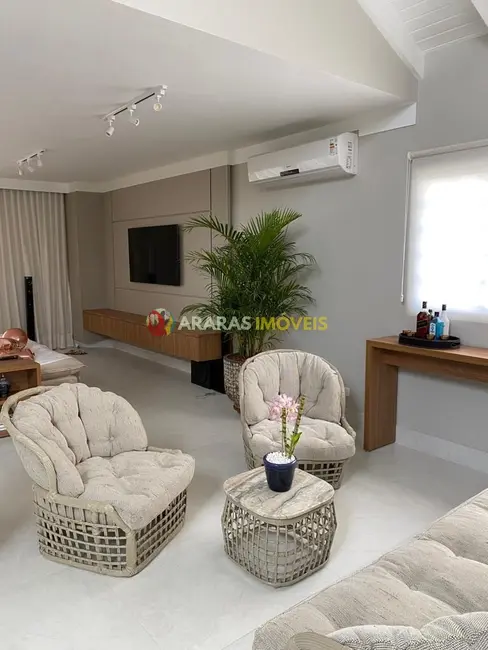 Foto 1 de Casa com 4 quartos à venda, 265m2 em Riviera de São Lourenço, Bertioga - SP