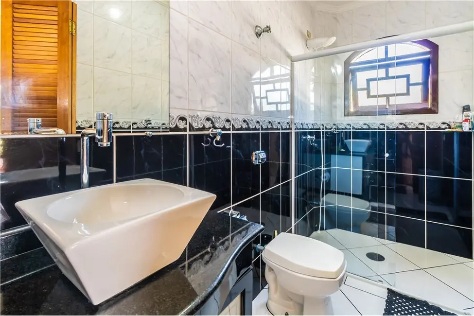 Foto 9 de Casa com 6 quartos à venda, 317m2 em Caiçara, Praia Grande - SP