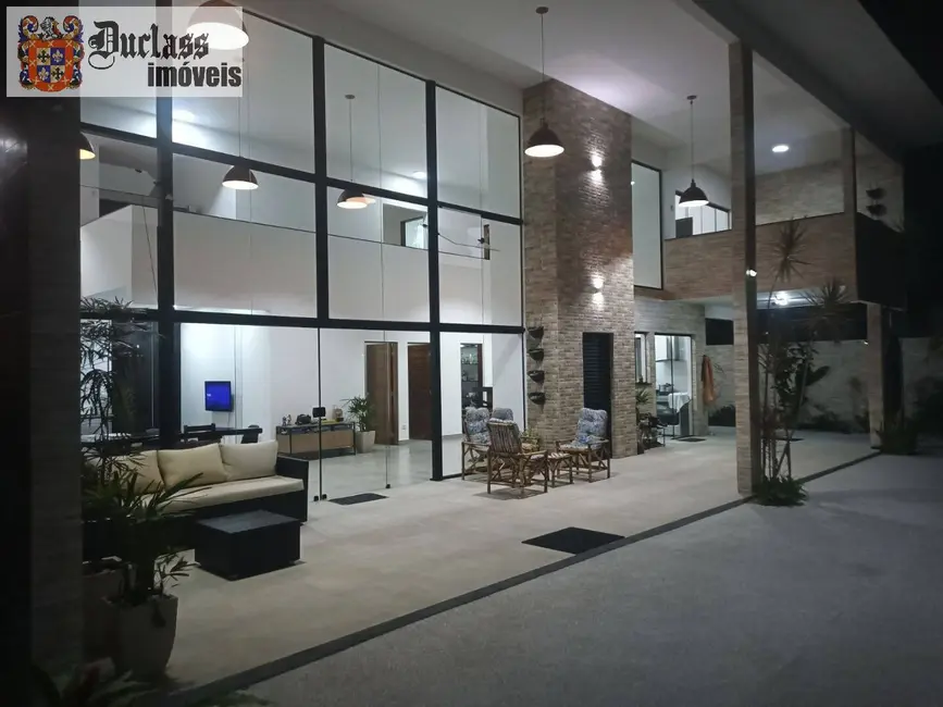 Sobrado com 4 quartos à venda, 360m2 em Ubatuba - SP - imagem 4 Foto 4 de Sobrado com 4 quartos à venda, 360m2 em Ubatuba - SP
