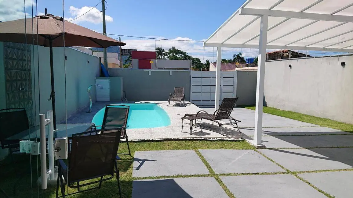 Foto 1 de Casa com 3 quartos à venda, 107m2 em Massaguaçu, Caraguatatuba - SP