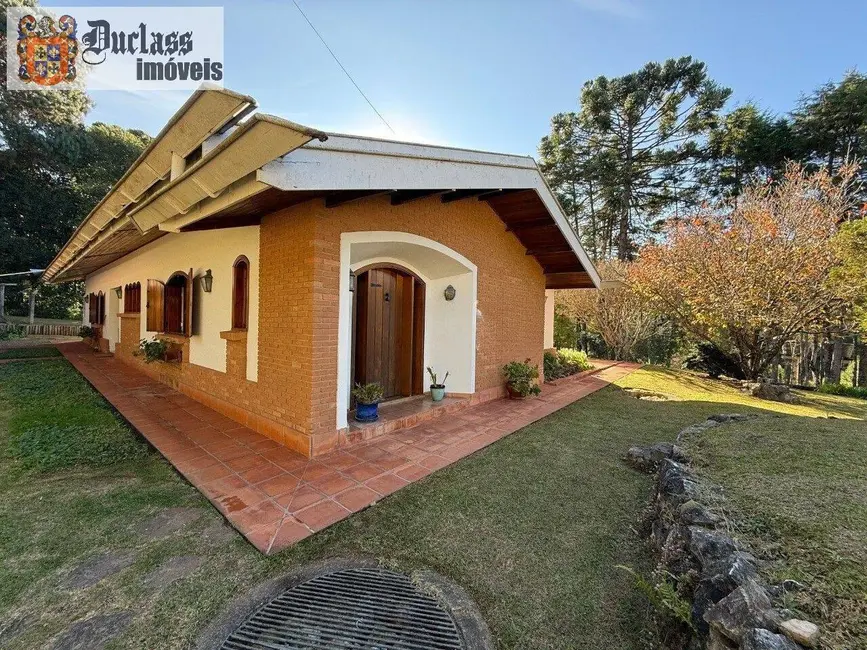 Foto 2 de Casa com 4 quartos à venda, 267m2 em Campos Do Jordao - SP