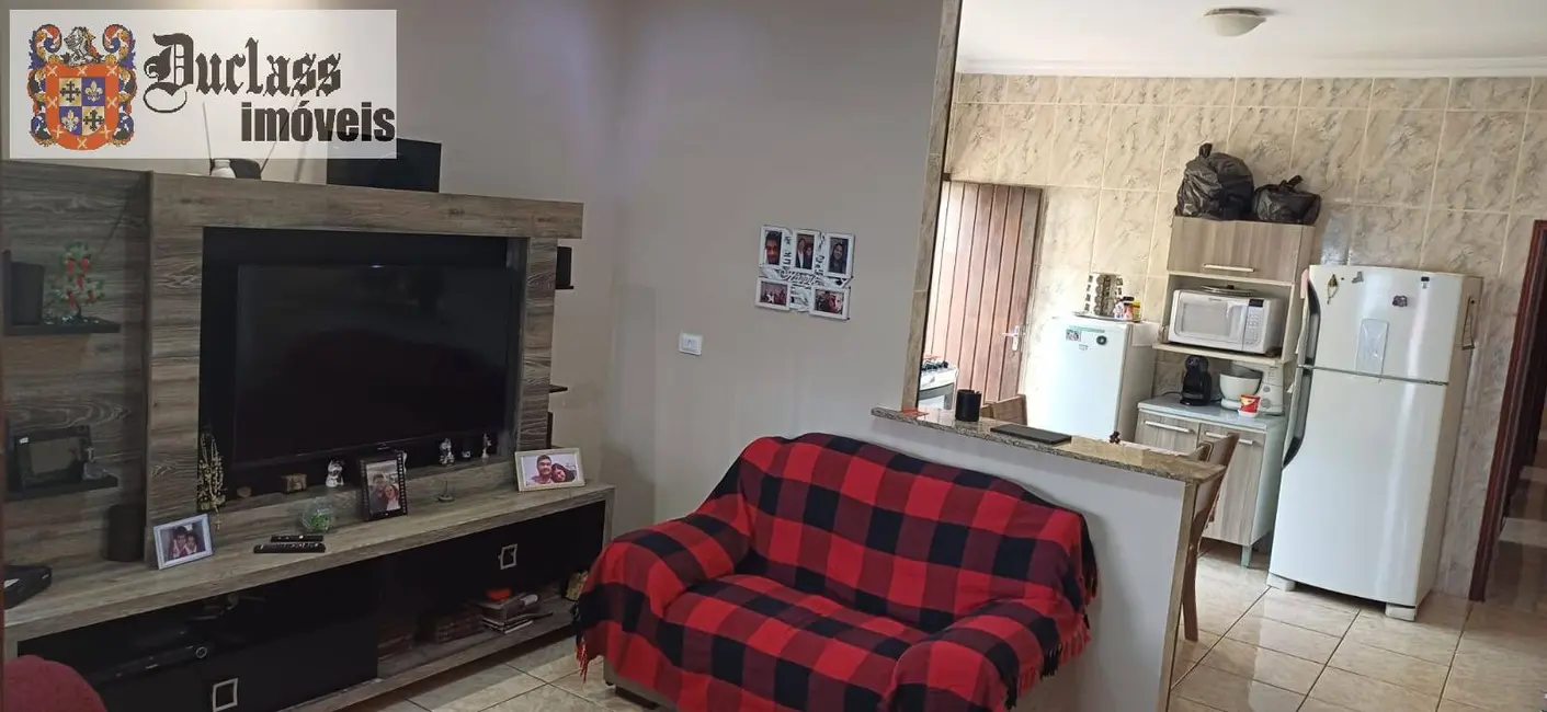 Foto 2 de Casa com 3 quartos à venda, 114m2 em Maracanã, Praia Grande - SP