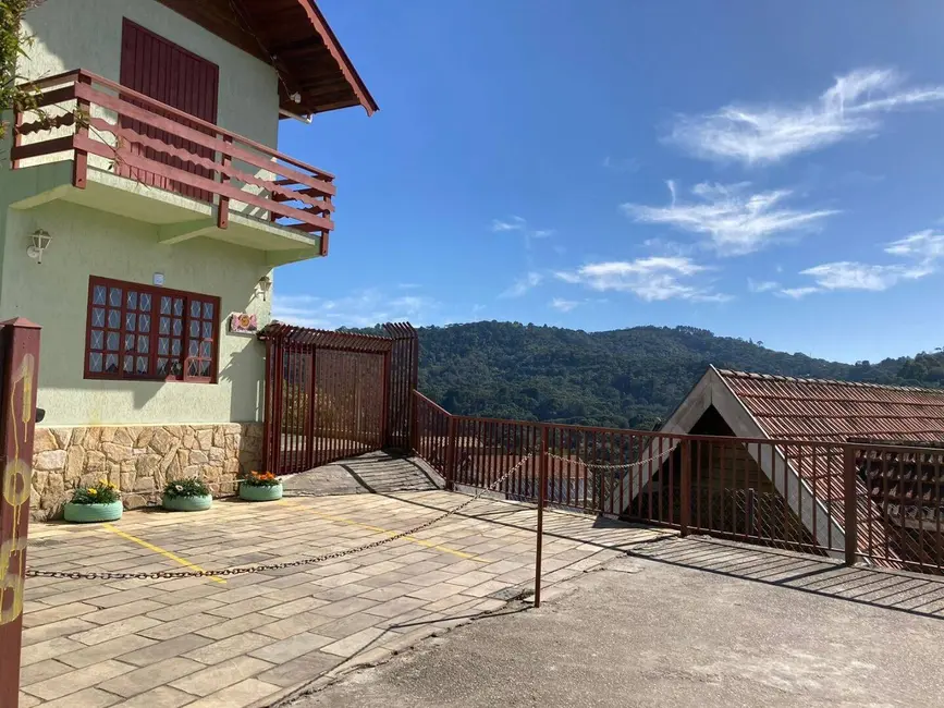Foto 2 de Sobrado com 4 quartos à venda, 260m2 em Campos Do Jordao - SP