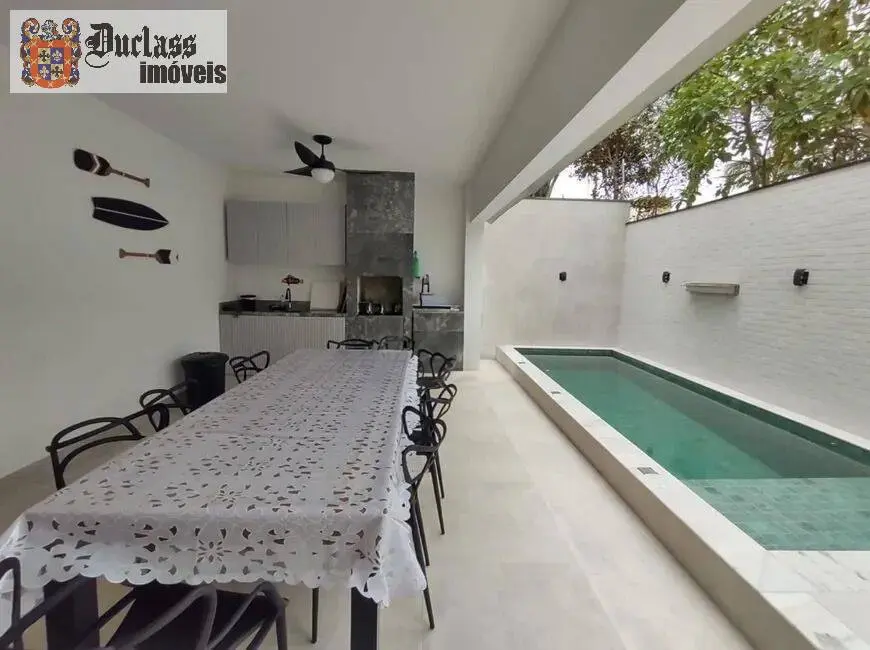 Sobrado com 4 quartos à venda, 290m2 em Loteamento João Batista Julião, Guaruja - SP - imagem 1 Foto 1 de Sobrado com 4 quartos à venda, 290m2 em Loteamento João Batista Julião, Guaruja - SP
