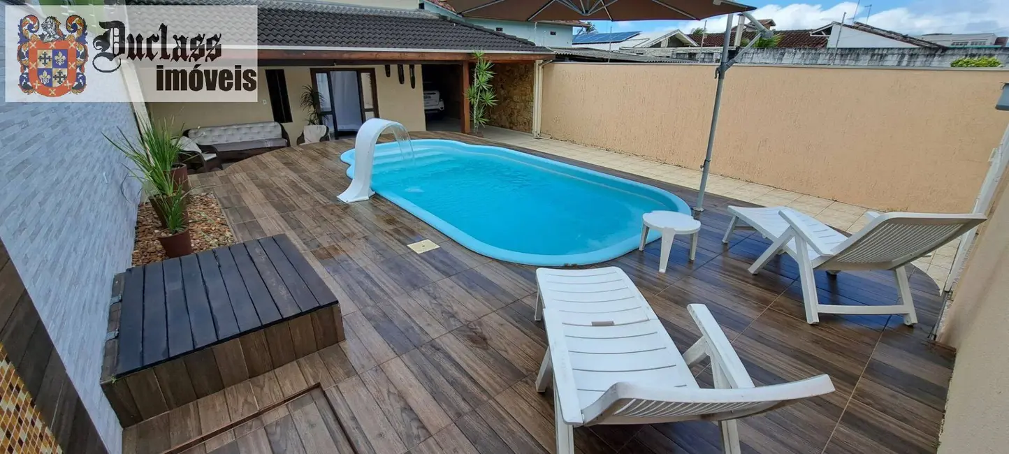 Foto 1 de Sobrado com 4 quartos à venda, 246m2 em Indaiá, Caraguatatuba - SP