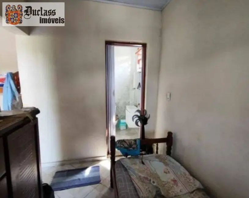Sobrado com 3 quartos à venda, 250m2 em Itanhaem - SP - imagem 8 Foto 8 de Sobrado com 3 quartos à venda, 250m2 em Itanhaem - SP