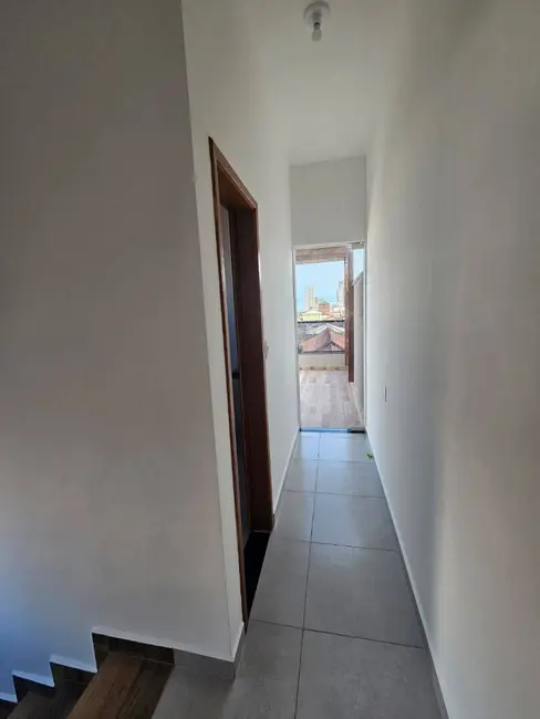 Foto 5 de Sobrado com 3 quartos à venda, 100m2 em Maracanã, Praia Grande - SP